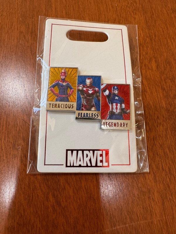 MARVEL ATTRIBUTES CAPTAIN AMERICA, CAPTAIN MARVEL AND IRON MAN PIN