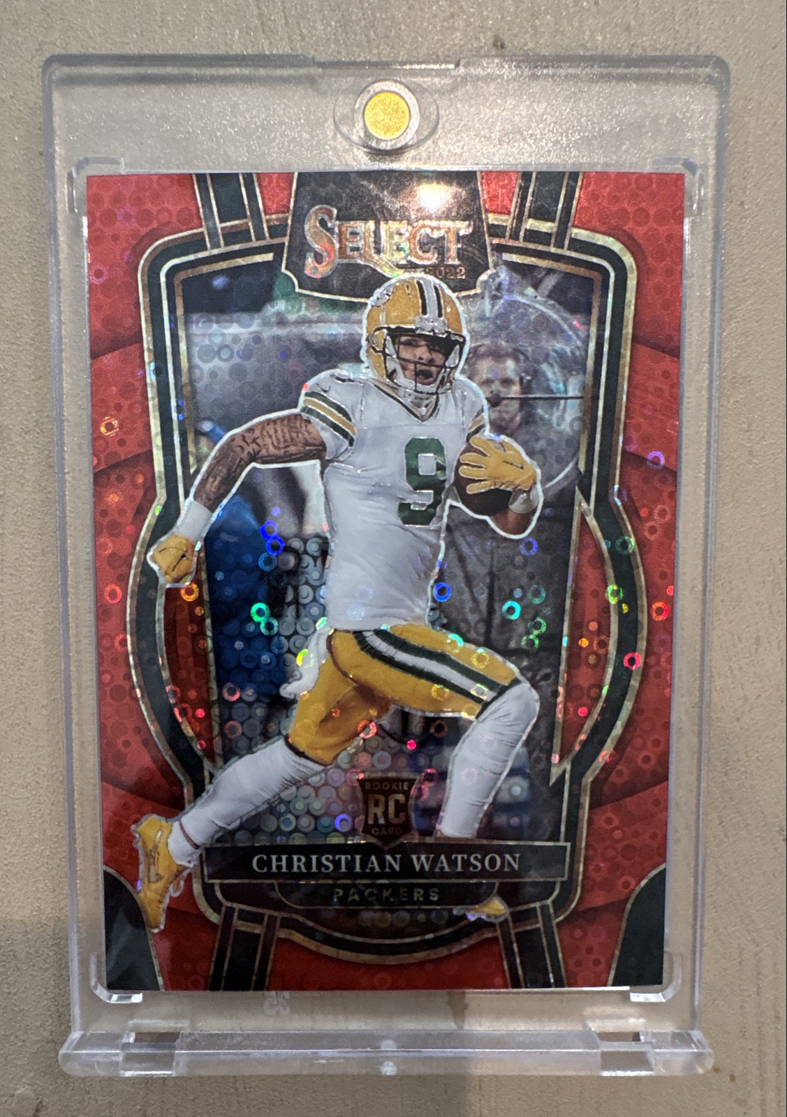 2022 Panini Select - Concourse Christian Watson #53 Red Disco Prizm /49 (RC)