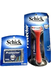 schick protector handle and 7 total cartridges LOOK AT AD PICS PLEASE