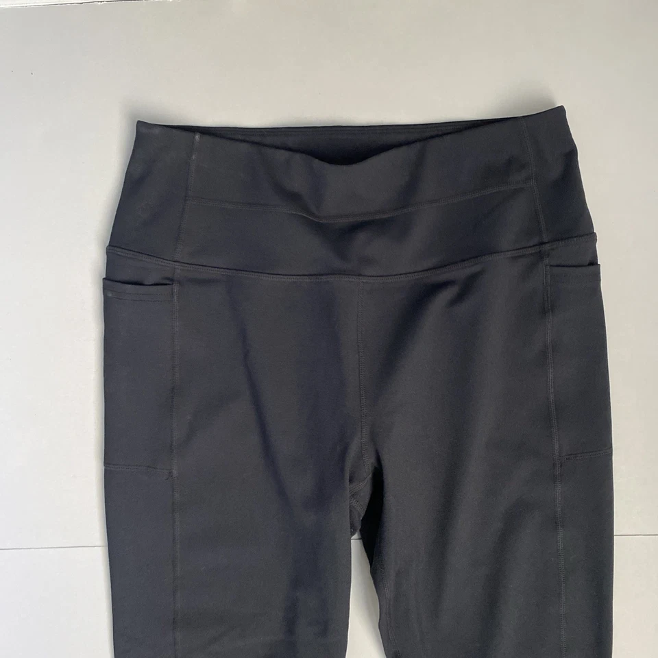 Leggings grandes para mujer Sketchers GoWalk negros con bolsillos ropa deportiva Foto 3 de 4