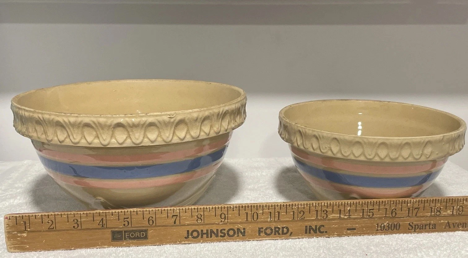 A pair (2) vintage American stoneware mixing bowls with banded decoration.