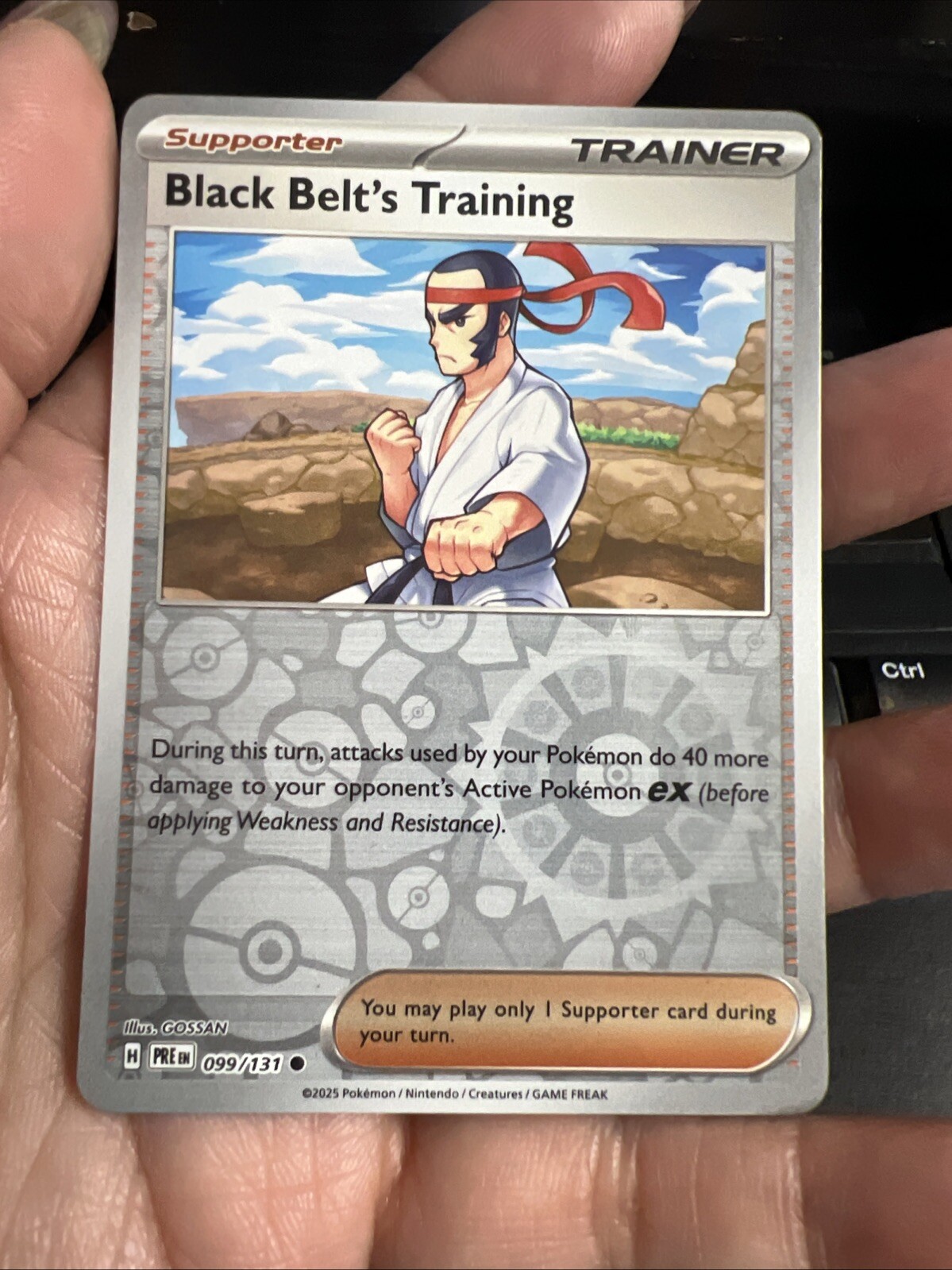 Pokemon Prismatic Evolutions SV: Black Belt's Training 099/131 Reverse Holo NM