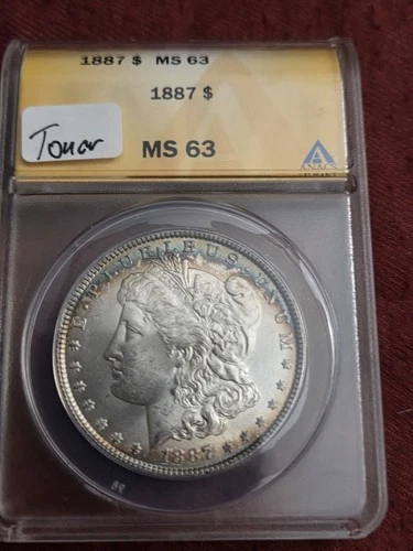1887-P MORGAN SILVER DOLLAR ANACS GRADED MS63 NICE TONING
