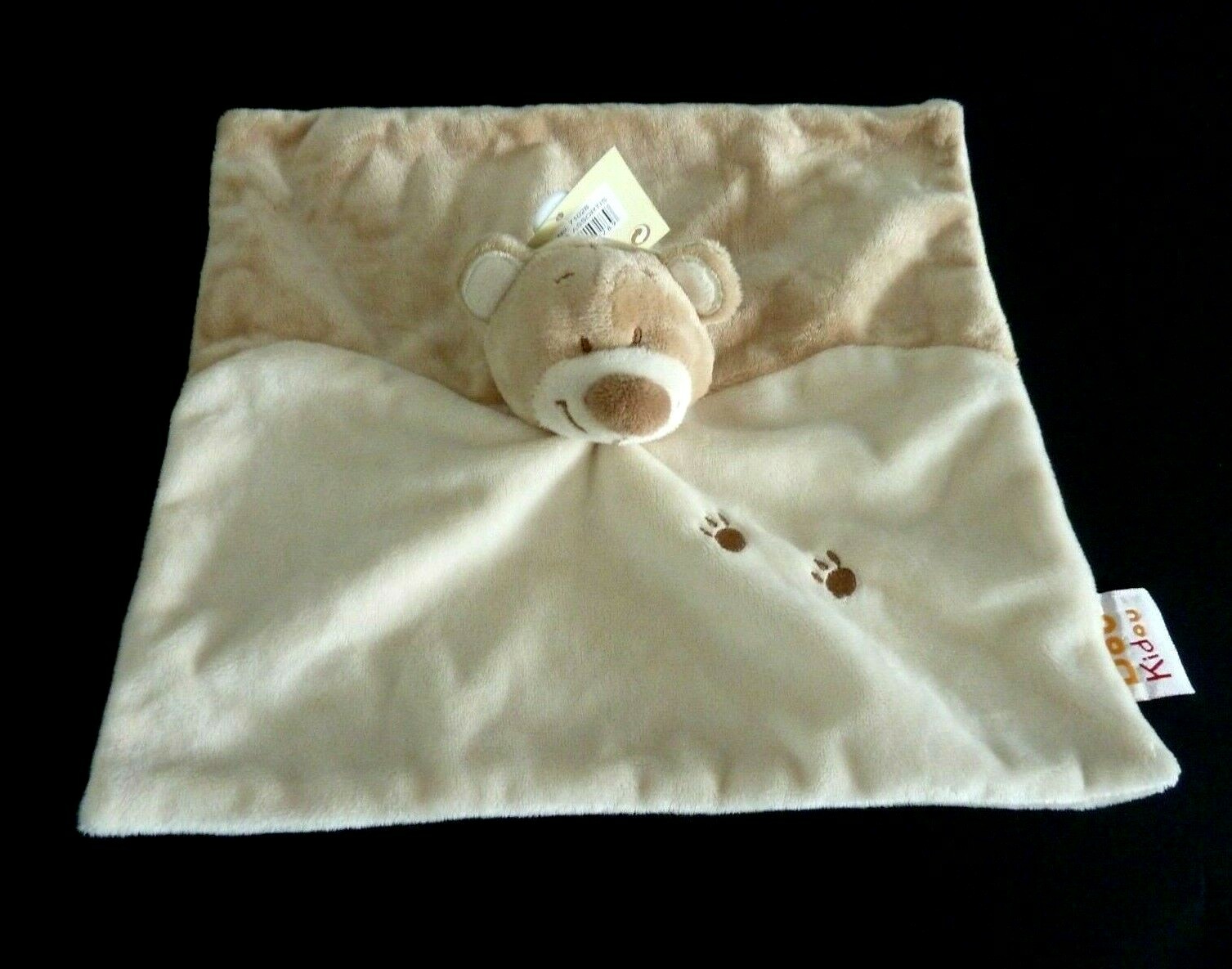 Doudou plat ours marron Dou Kidou, la peluche beige et écru qui rassure bébé
