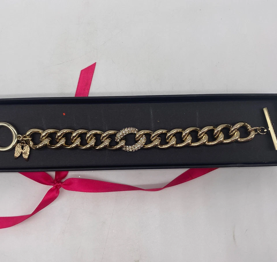 Nuevo Brazalete Victorias Secret Dorado Eslabón Palanca Con Dije de Ala Talla Única Nuevo en Caja Foto 2 de 4
