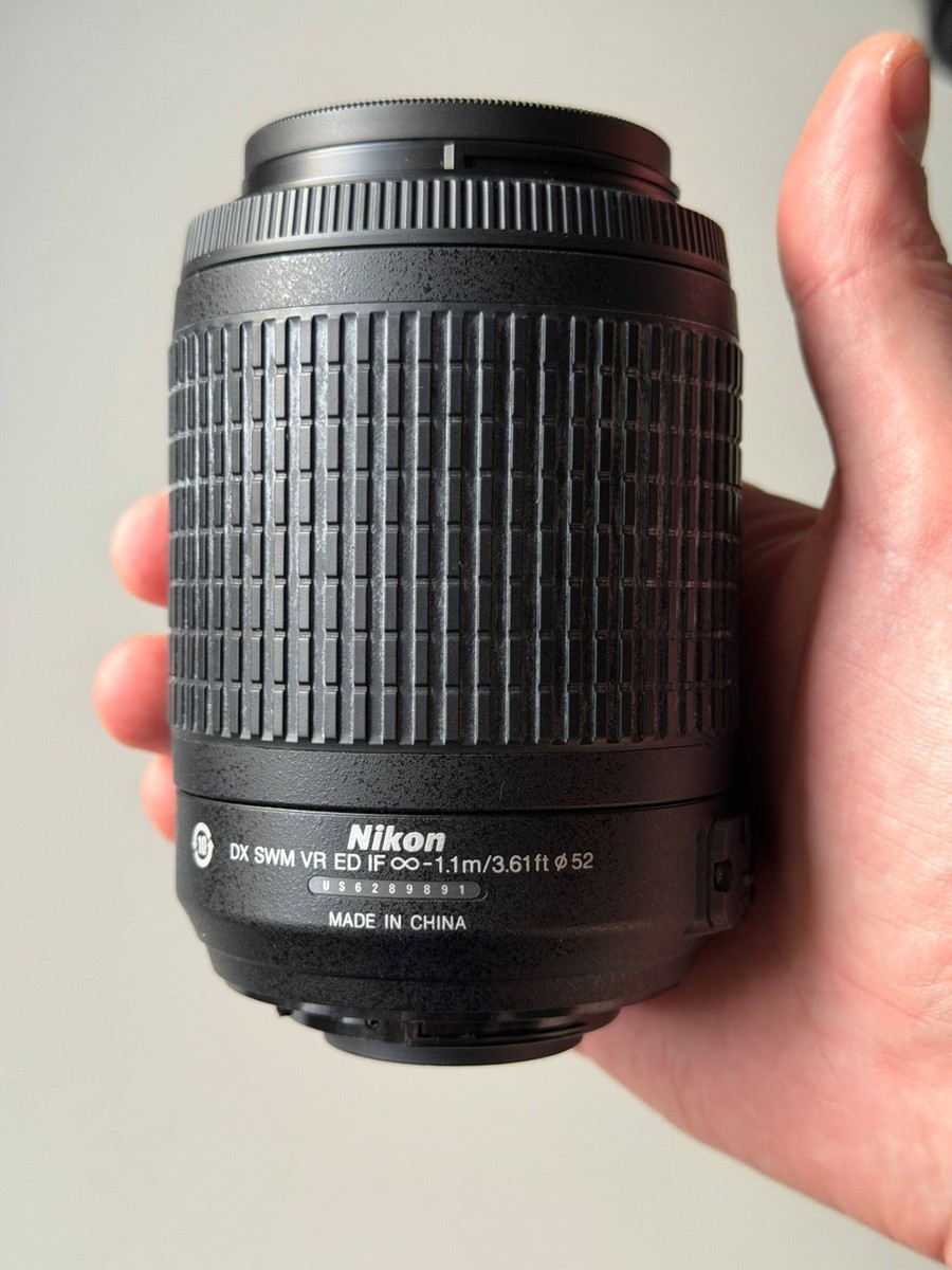 Nikon D5100 Digital SLR Camera w/ Nikkor DX AF-S VR 55-200mm ED