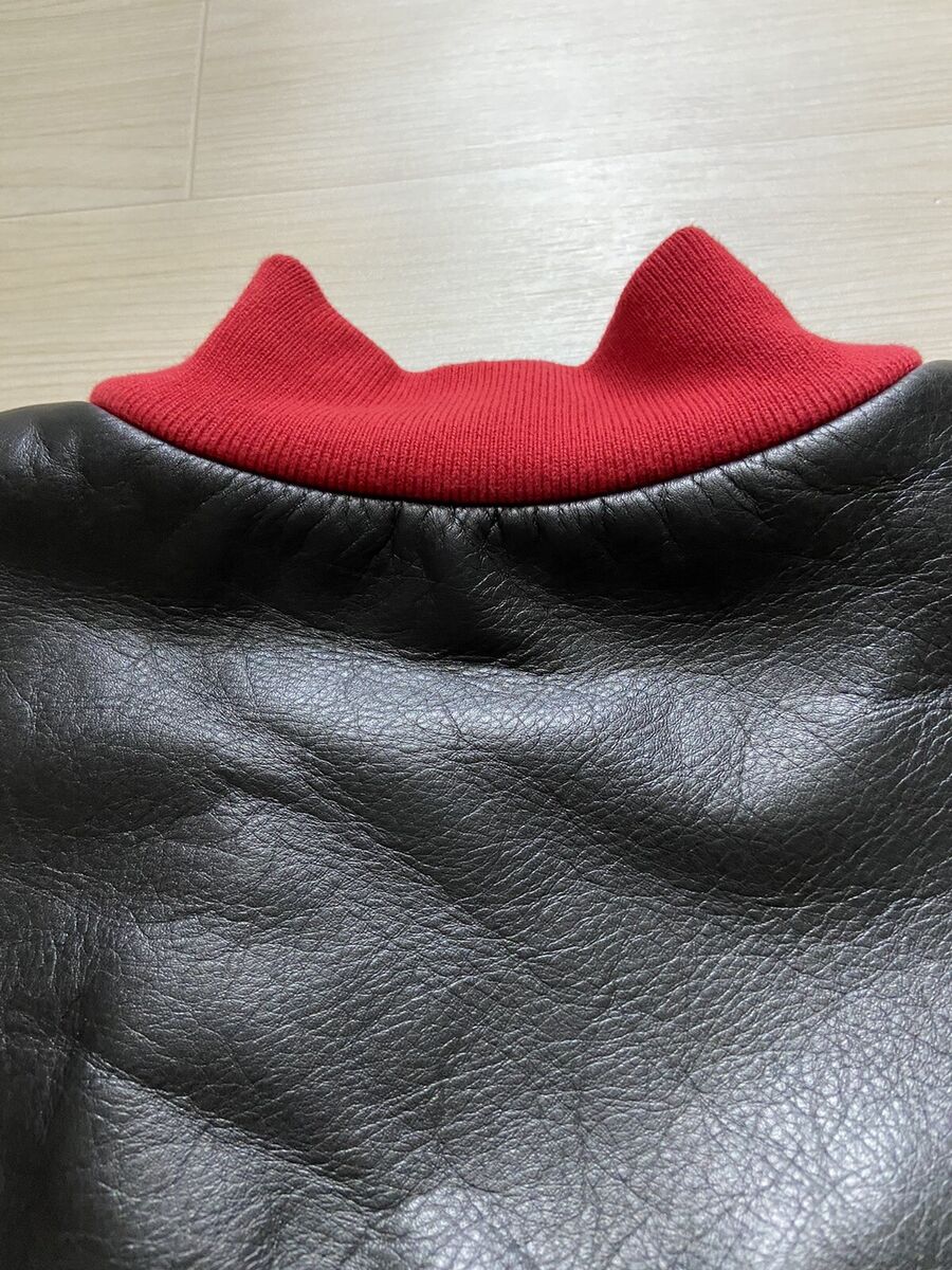 44 Balenciaga Leather trimmed BB logo varsity bomber jacket 44 Balenciaga Leather trimmed BB logo varsity bomber jacket