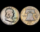 Rainbow Toned 1957 Franklin Half Dollar- ANACS MS65