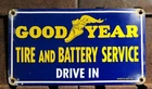 VINTAGE 1957 DATED GOOD YEAR TIRE BATTERY 12” PORCELAIN DRIVE IN GAS OIL SIGN