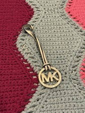 MICHAEL KORS genuine gold logo bag charm with tan leather strap 7"