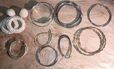Lot E22 - 9 Pairs of Hoop Style Earrings Gold Silver Natural Tone