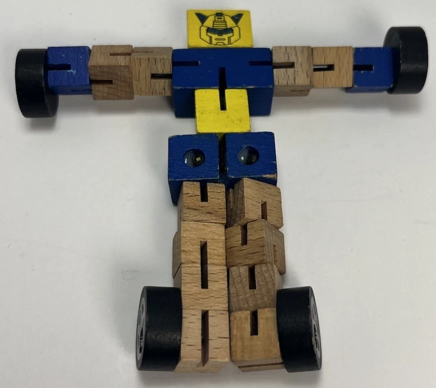 Figura de acción cambiable de madera Transformer Toy Robot Foto 3 de 4