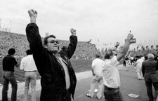 Actor James Garner cheers the Raiders and fan...