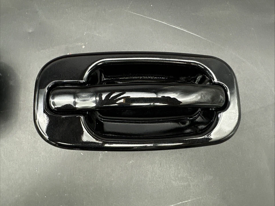 Tahoe Silverado Sierra Suburban Yukon 1999-2006 - JUEGO DE 4 MANIJAS DE PUERTA gris espiral. Foto 4 de 4