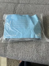 United Airlines Felt Drawstring Amenity Kit by Molton Brown, London
