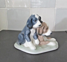 NAO BY LLADRO "TWO TIRED PUPPIES" FIGURE. #1046
