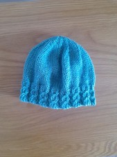 New hand knitted sea green cable border baby hat size 0-3 months