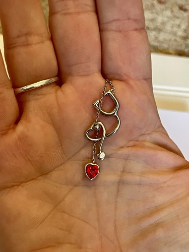 Collana in argento sterling 925 con rubini scintillanti laurea infermiera marcata usata - Foto 1 di 5