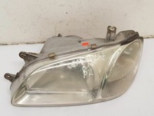 KIA Carnival 2000 Left Front headlight 0K55251020 VEI3009