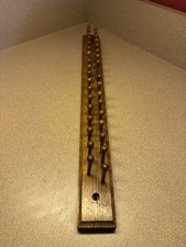 Vintage wooden tie rack with 35 hooks, wall-mounted.  92  