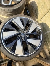 genuine Audi RS e-tron GT 21-inch OEM wheels, in the black/diamond-cut style