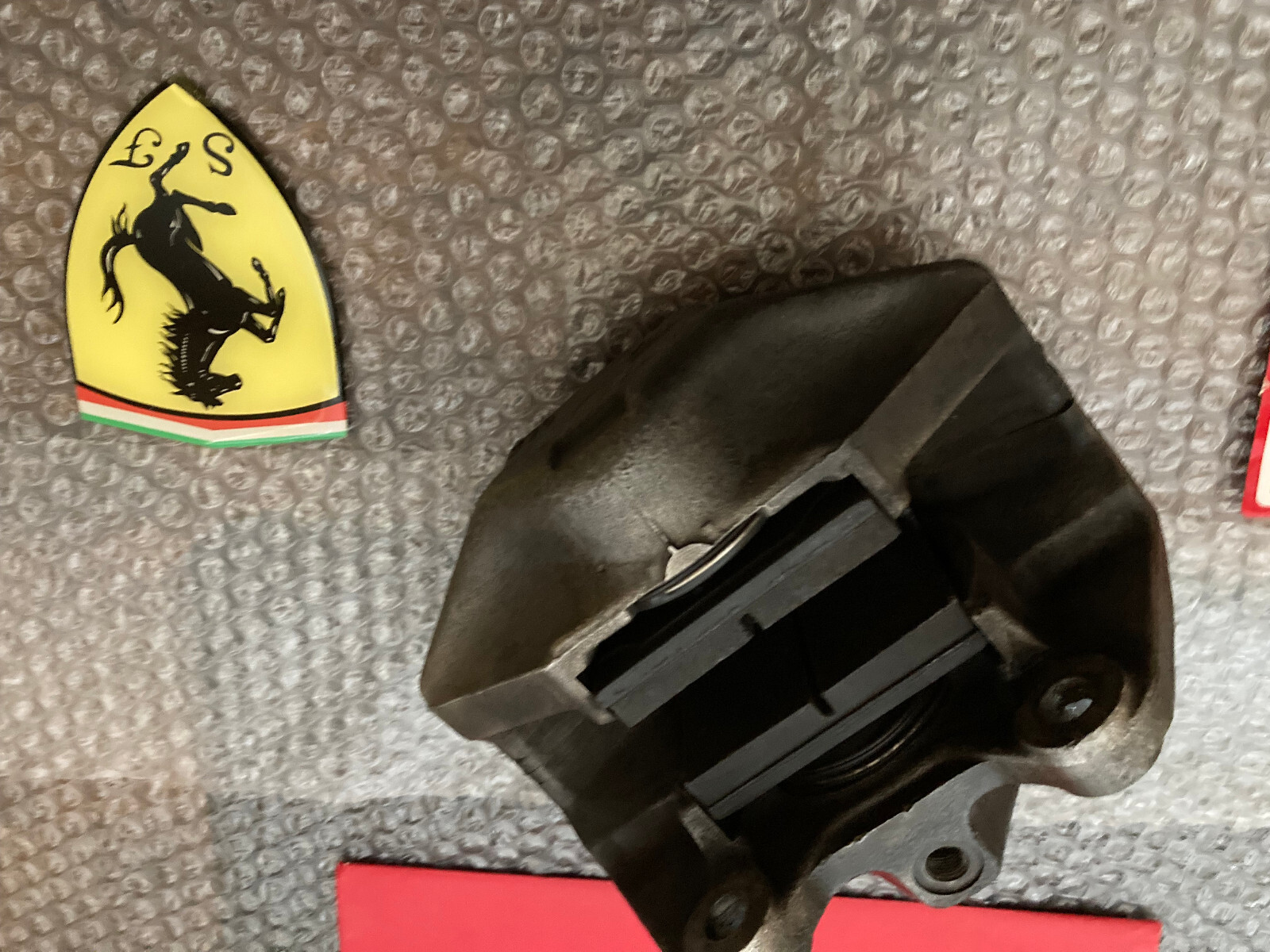 Ferrari 308-Gts Driver side RH Front Brake Caliper P/N 106357 is Oem Part.