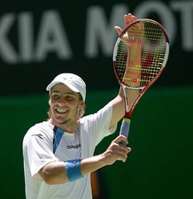 Gaston Gaudio of Argentina v Dominik Hrbaty of Slovakia during day- Old Photo
