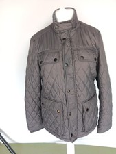 Men's Charcole quiltedJacket size M. Zip up Waterproof and lined