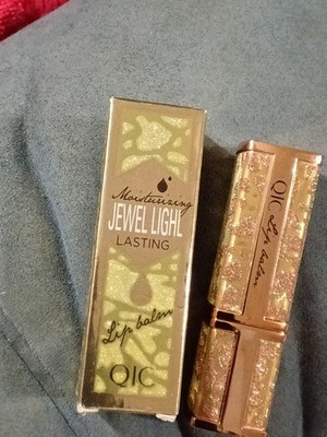 QIC MOISTURIZING LASTING LIP BALM 02 GRAPEFRUIT JEWEL LIGHT CASE. NEW