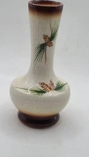 Vase by Rocky Mountain pottery. Beige w/ pinecone,needles. Faux crackle. Vintage