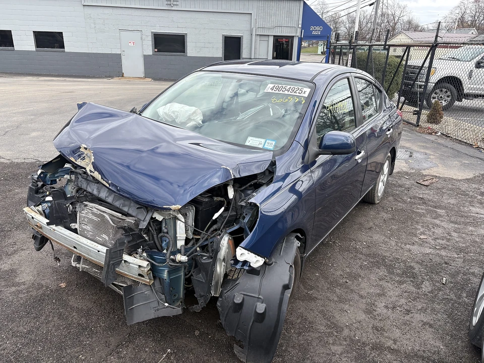 Used Left Tail Light Assembly fits: 2012 Nissan Versa quarter panel mounted Sdn - Image 4 of 4