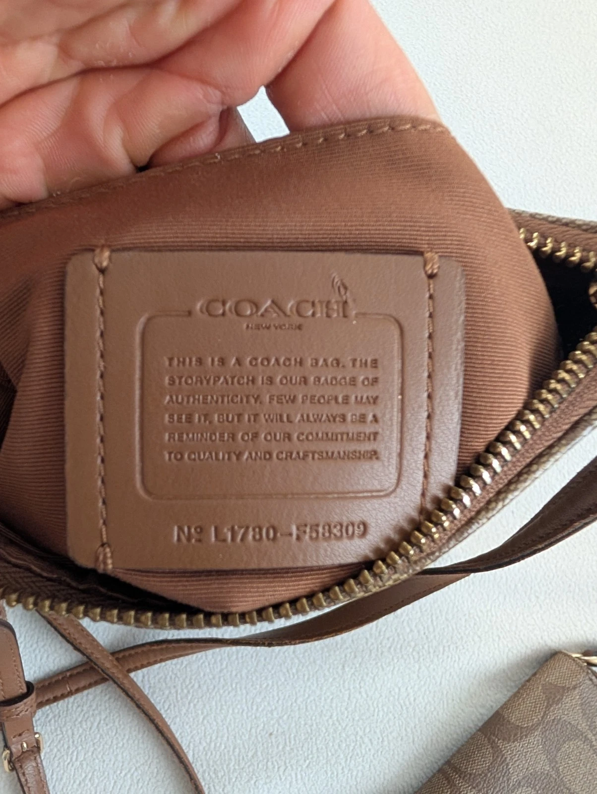 Lotto portafoglio Coach Swingpack Signature marrone marrone marrone chiaro F58309