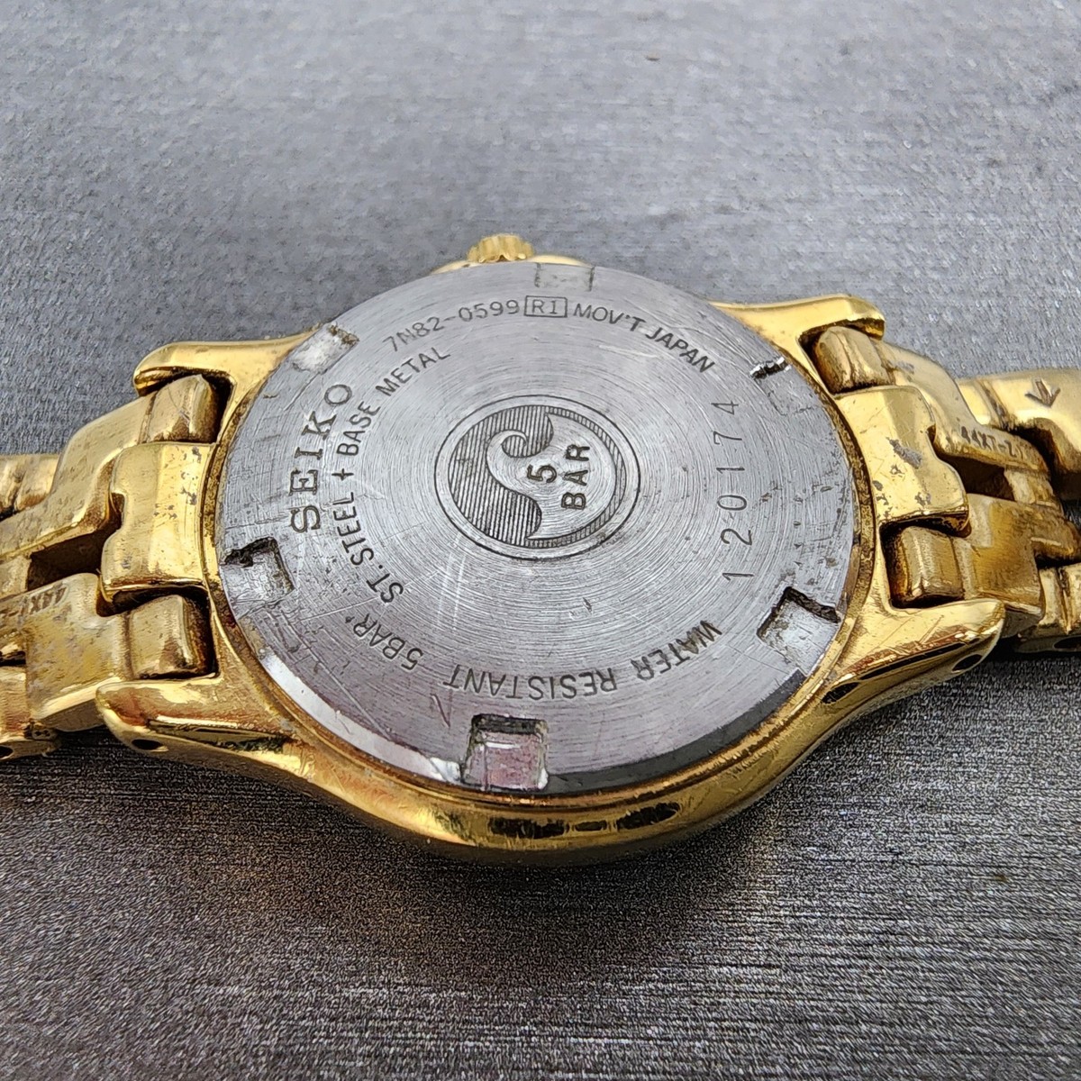 Seiko Watch Women 26mm Champagne Dial Gold Tone Date Round