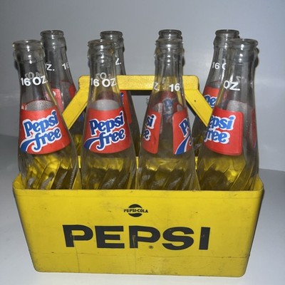 8 empty bottles of Pepsi free vintage 1975 Pepsi 16oz clear glass.