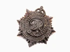 WW2 Royal Army Service Corps (RASC) Plastic Economy Cap Badge