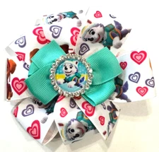 Beautiful Paw Patrol (Everest) Inspired hair bow for girls.