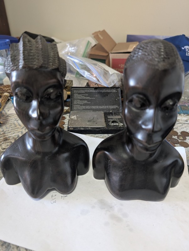 A Pair Of Ebony Figures