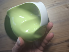 Luigi Colani Kaffeebecher grün und schwarzer Unterteller Designer