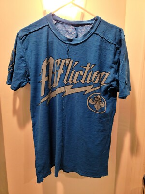 Affliction buckle mens t-shirt size S, but fits like a medium.  