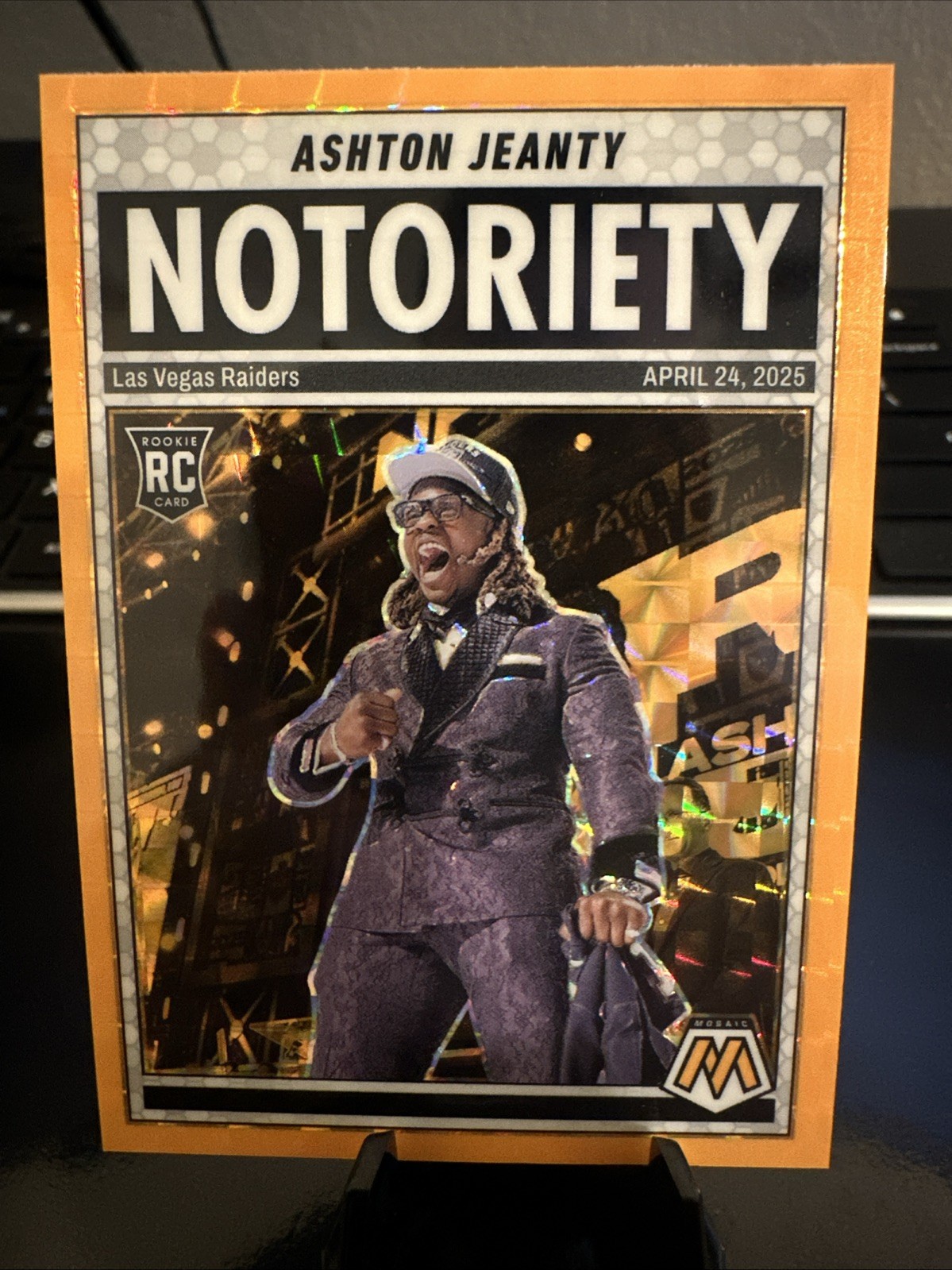 2025 Panini Mosaic - Notoriety Ashton Jeanty #18 Orange Fluorescent Mosaic Prizm