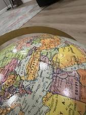 Rotating Topographical 2000 s World Globe Map...