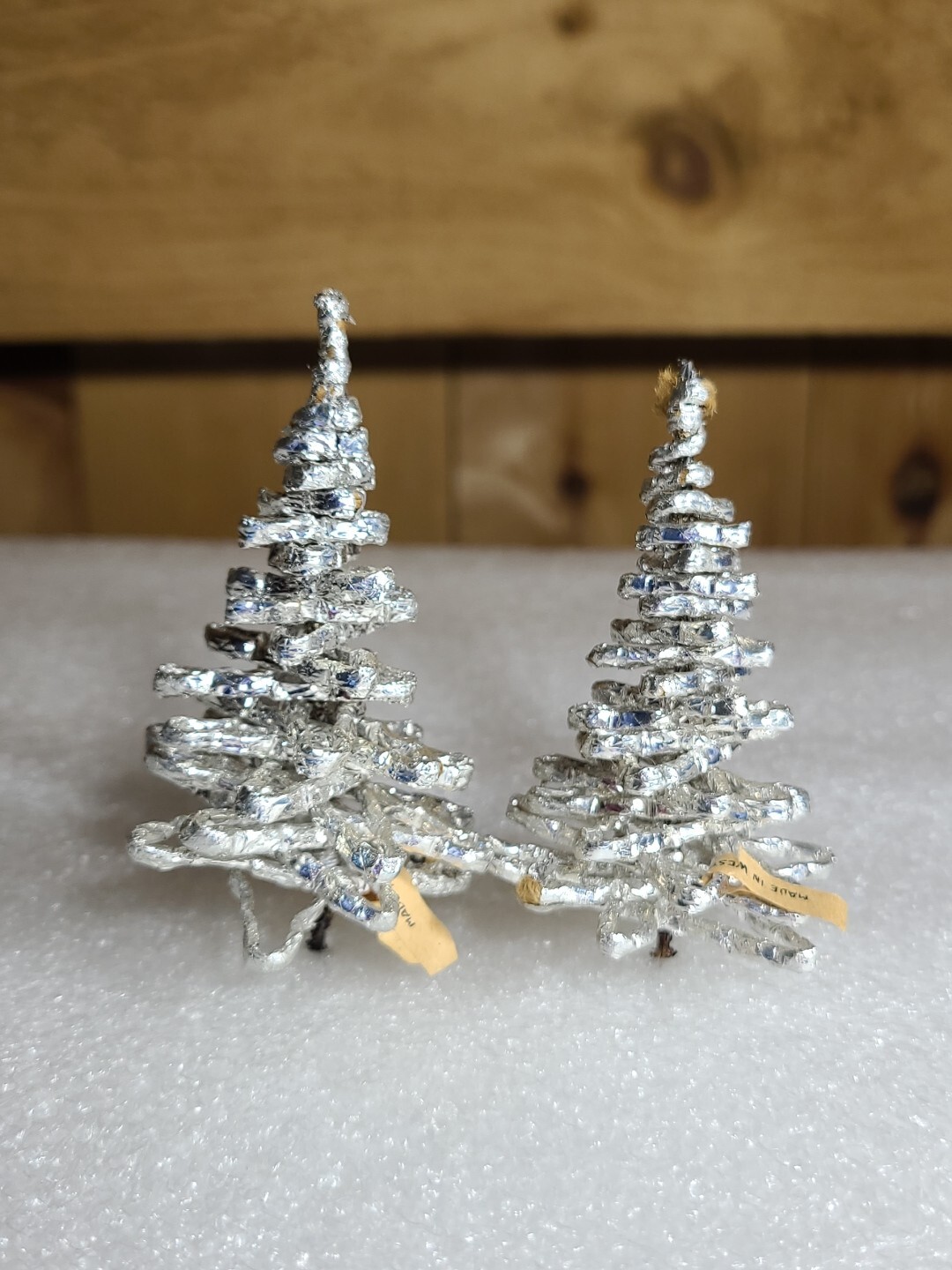 4 VTG 1950’s GERMAN SILVER FOIL TINSEL CHRISTMAS TREES, 1 WITH METAL