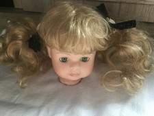 Porcelain Doll Head with Blonde Curly Hair Black Hair Ties Blue Eyes 4"Long Used