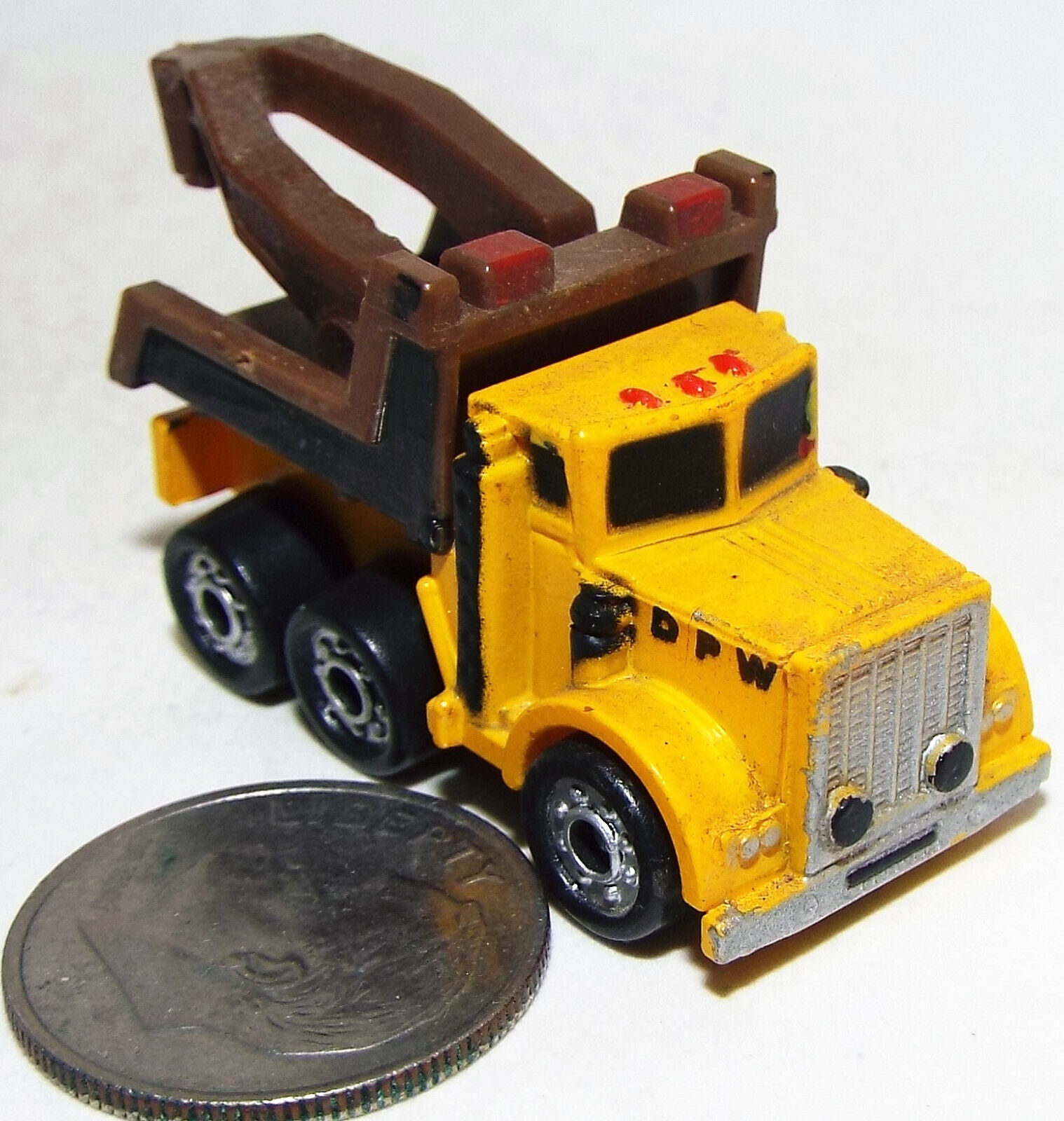 Small Funrise Heavt Duty TowTruck in Yellow and Brown marked DPW