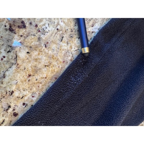 Black quarter zip fleece pullover with visible stitching and brushed texture, made in USA.