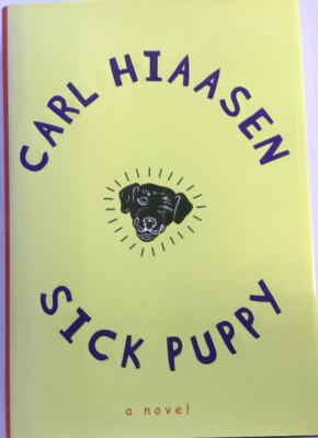 Carl Hiaasen- Sick Puppy -Signed & Dated  HC/DJ 1st/1st 1999 Very Good