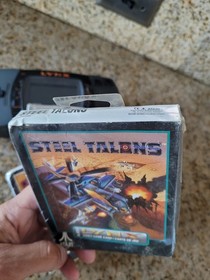 Vintage Atari Lynx Video game system and 3 Sealed Games brand new !!