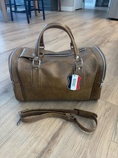Borsone vintage American Tourister da trasporto manici e tracolla in pelle marrone