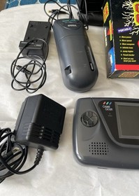 Sega Game Gear System- Console + 21 Games + Genie + Case and Accessories Works