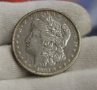 1884 0 US Morgan Silver Dollar $1 VF (Cleaned)